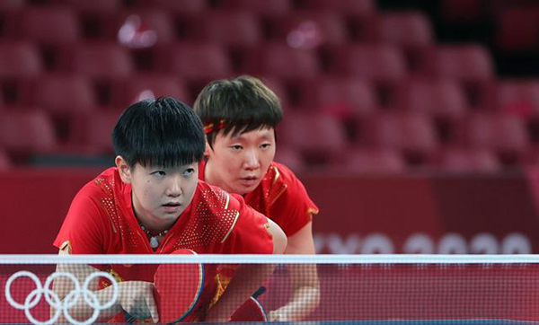 东京奥运会乒乓球：中国男、女团双双晋级八强