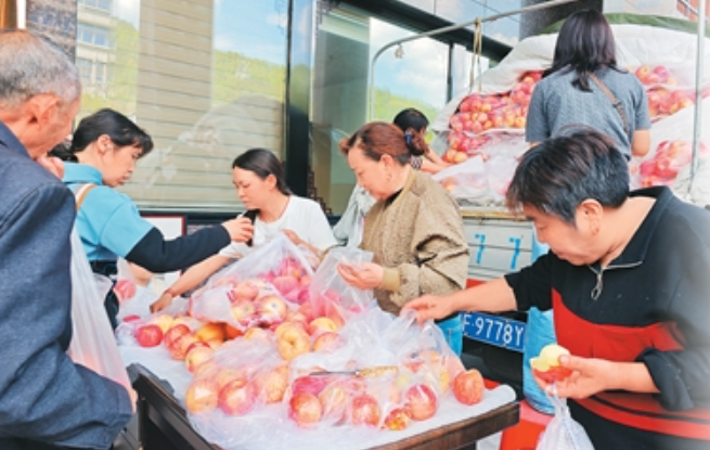 一车苹果温暖两座城